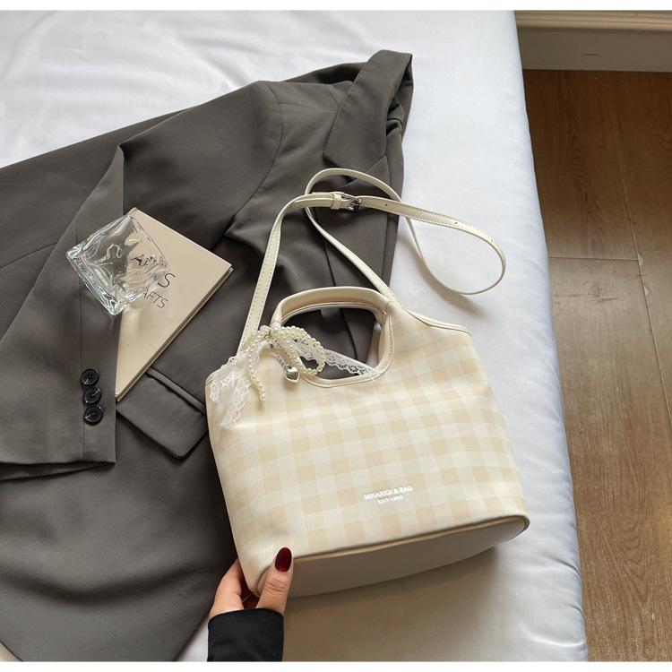 Korean version plaid contrasting color handbag women's 2025 summer new niche design messenger bag simple shoulder bag