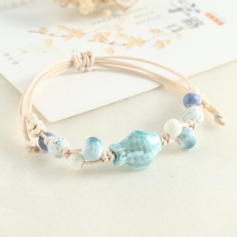 Jingdezhen Keramik Perlenarmband - Handgewebtes Porzellan mit Muschelakzenten