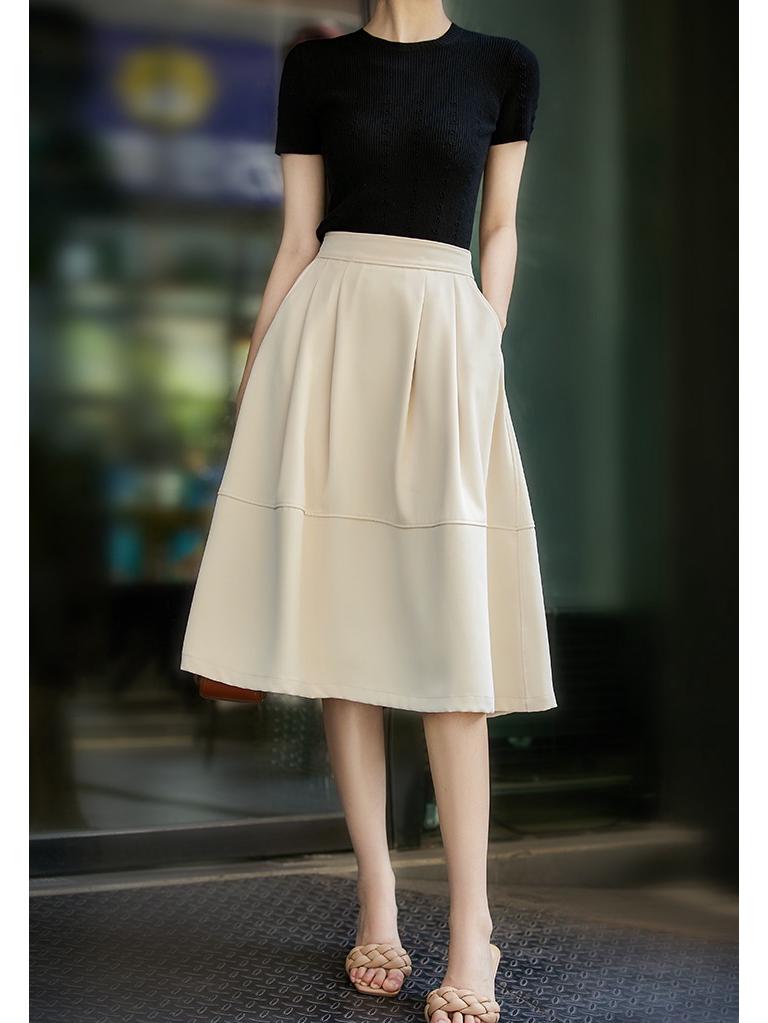 Elegantní sukně áčkového střihu s vysokým pasem ve stylu Hepburn - Dámská móda léto 2025