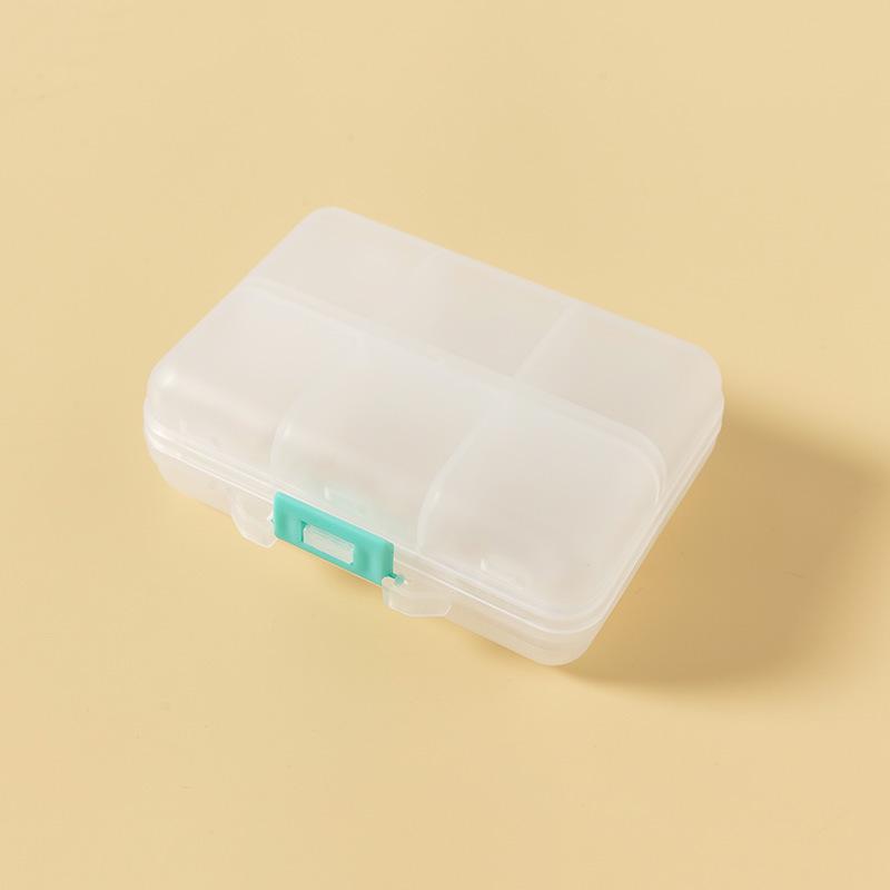 Pilulier portable compact à double couche avec 10 compartiments pour un rangement sécurisé des médicaments