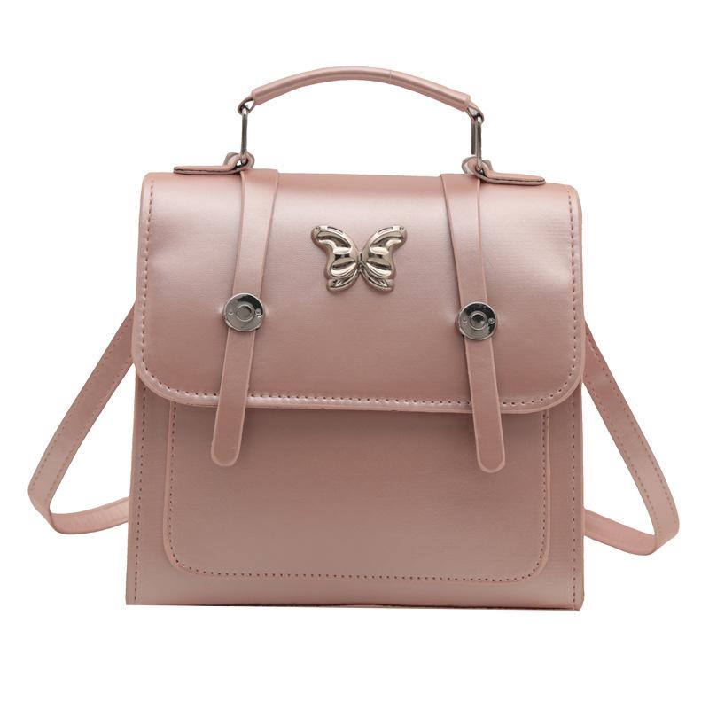

Korean version of casual small butterfly portable backpack women s 2024 summer new niche design single shoulder crossbody small square bag рожевий
