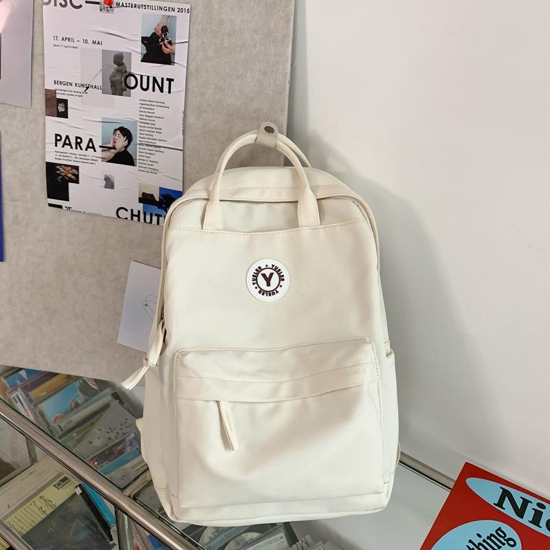 Japanese ins girl backpack Korean version of junior high school student schoolbag female tide large capacity solid color nylon handbag