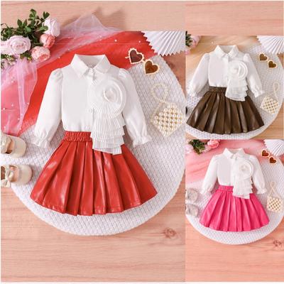 Autumn New Product Girls Long Sleeve Shirt with Flower + PU Leather Short Skirt
