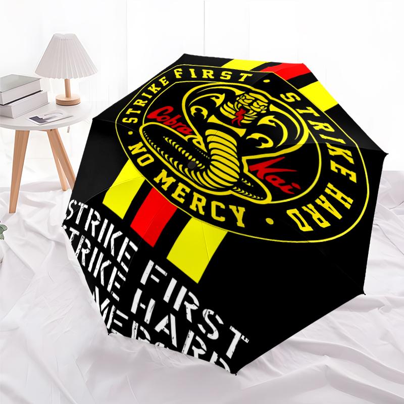Cobra Kai Fashionable Automatic Opening/Closing Folding Umbrella. Portable and Foldable, Ideal for Gift, Travel, and Daily Use.