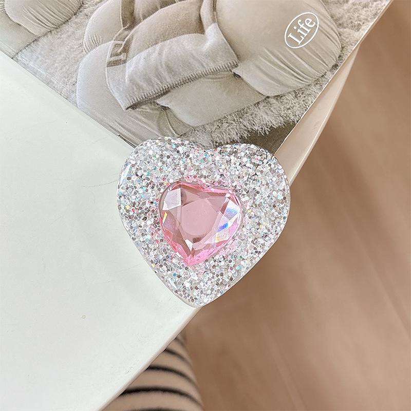 Retractable Phone Holder with Rhinestone Heart and Magnetic Airbag Support for Easy Viewing
