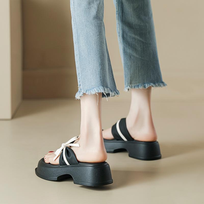 Retro thick-bottomed cool slippers wear summer new fashion bow one-word drag fairy wind cover toe Roman slippers girl