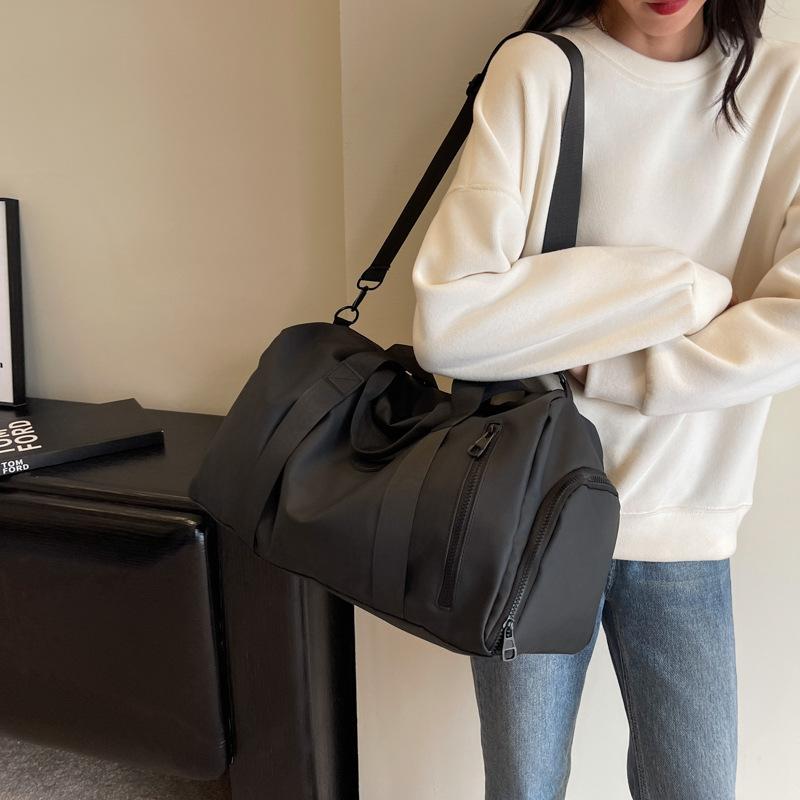 Travel bags Women's large-capacity women's handbags Men's short-distance business trips Luggage bags Yoga fitness bags Storage bags