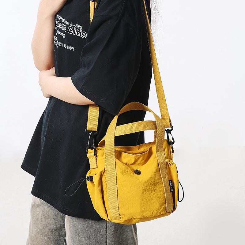 New casual handbag bucket bag fashion niche design bucket bag women's lightweight spring shoulder messenger bag