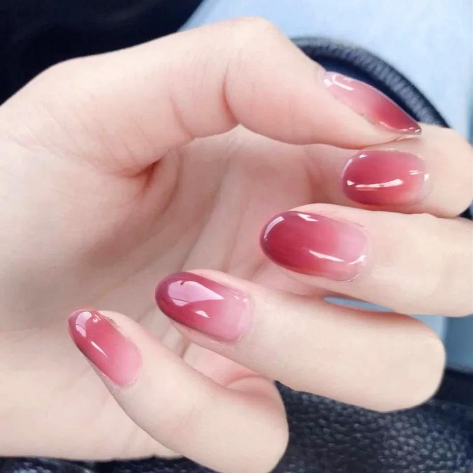 

Gradient Pink Round Head Medium-Long False Nails - Women s Removable Manicure Set