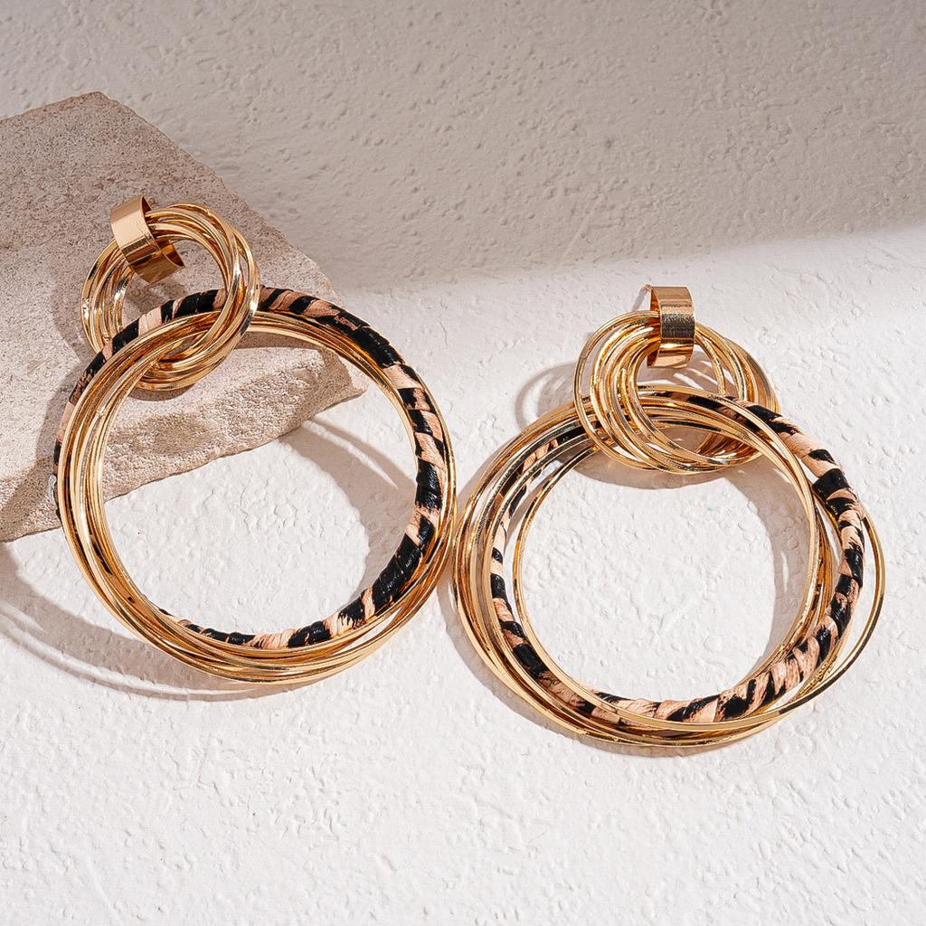 European and American retro leather leopard print multi-layer geometric round silver needle earrings niche earrings