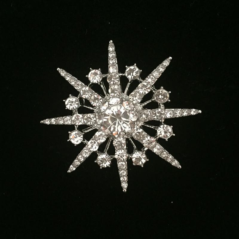 

Універсальна брошка-сніжинка з кристалами - Модний аксесуар для жіночих костюмів