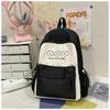 School bag female ins wind Korean version backpack contrasting colors Harajuku college wind campus junior high school students backpacking trip