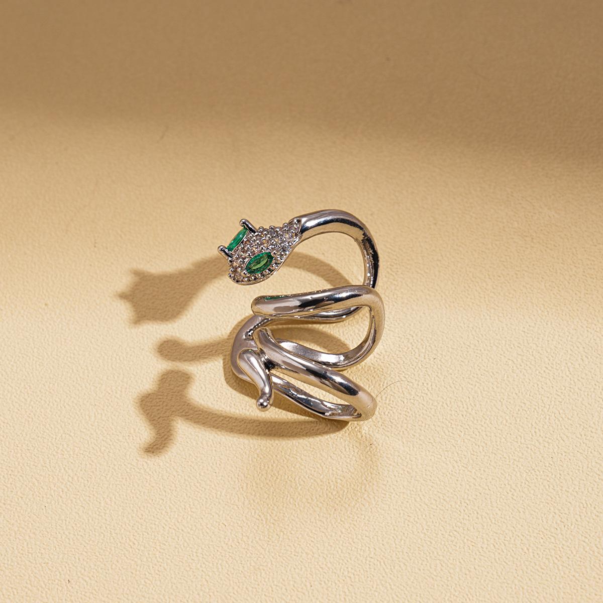 

Легкая роскошь циркон геометрический змеиный двойной C ушной костный зажим модные изысканные универсальные серьги