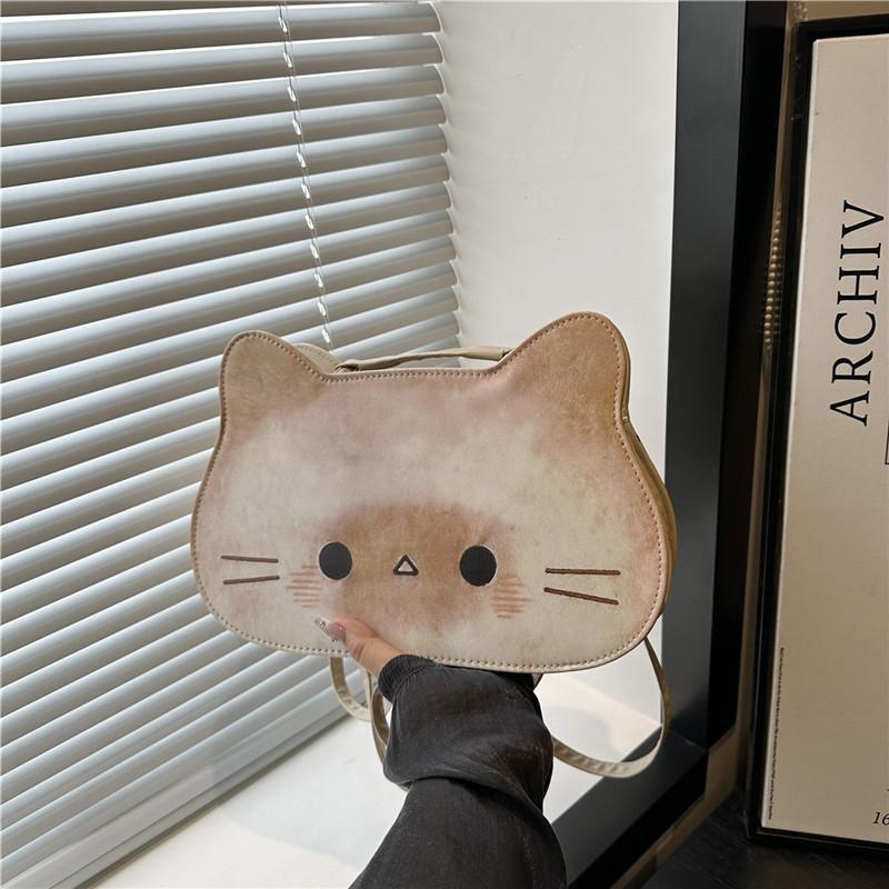 

Новая нишевая мультяшная милая и красивая креативная дизайнерская кошка большой вместимости на плечо сумка-мессенджер рюкзак коричневый