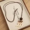 Chinese Floral Tassel Pendant Necklace - Ethnic Niche Design for Women, Versatile Long Sweater Chain Fashion Accessory