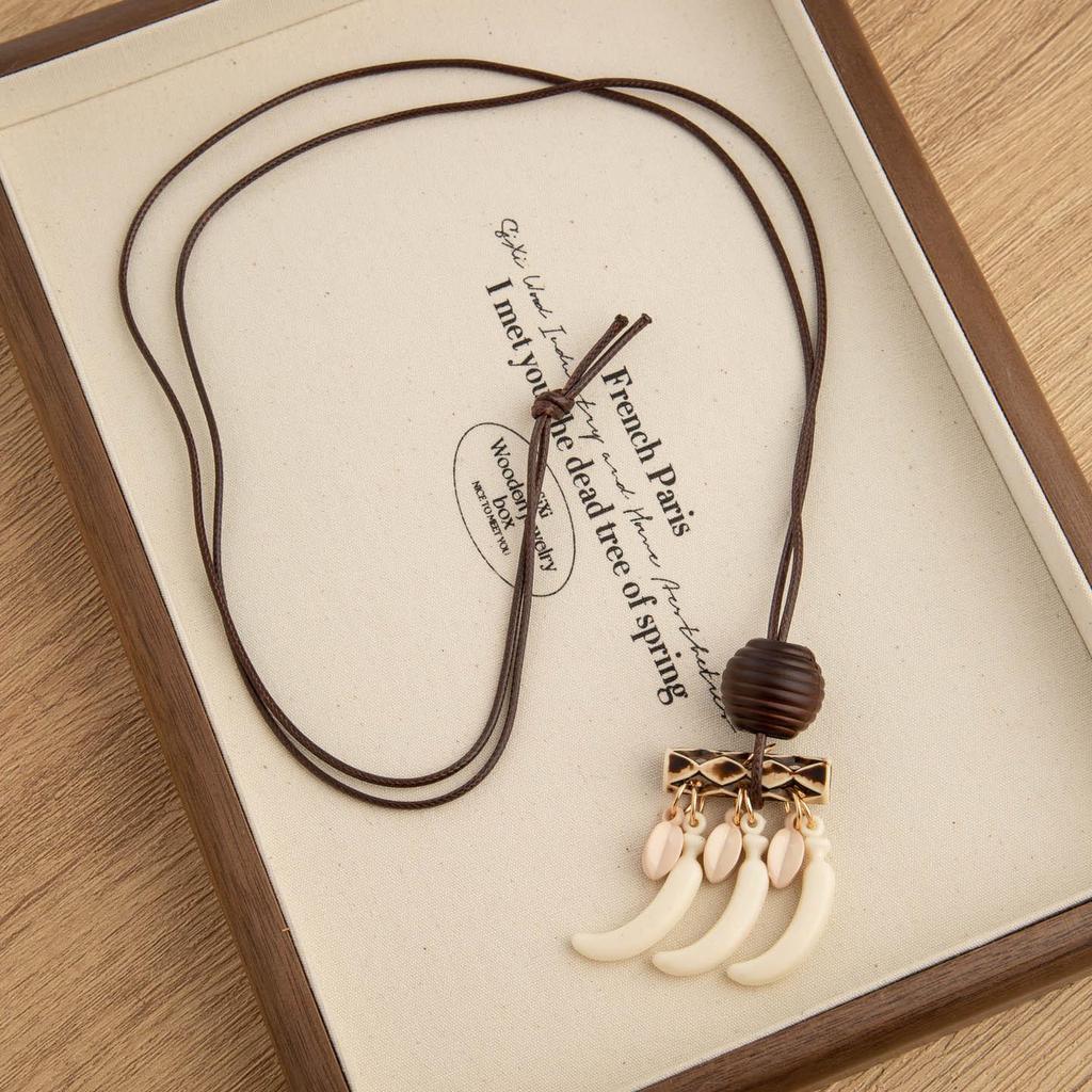 Chinese Floral Tassel Pendant Necklace - Ethnic Niche Design for Women, Versatile Long Sweater Chain Fashion Accessory
