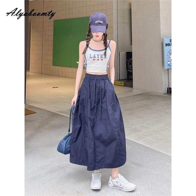 

Юбка миди А-силуэта в стиле сафари для лета и осени, женская, с высокой талией, белая, черная, темно-синяя, серая, с кулиской, повседневная, свободного кроя, с карманами One Size темно-синий