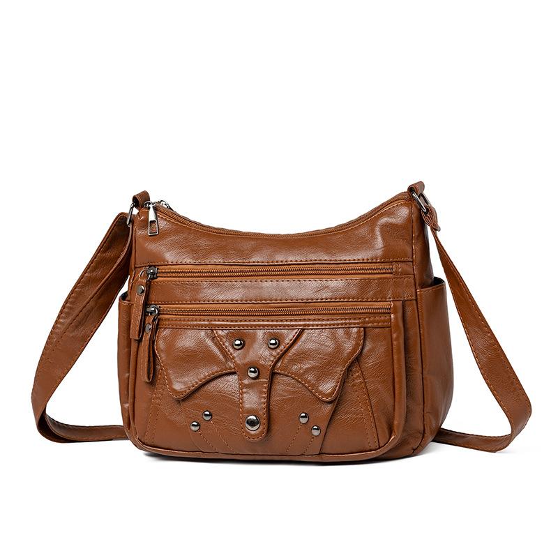 

New leather bag women s retro fashion large capacity middle-aged mother bag light casual messenger коричневый