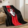 A shield with a soccer player heading a ball and vertical red stripes. for all seasons blanket lunch break throw gift