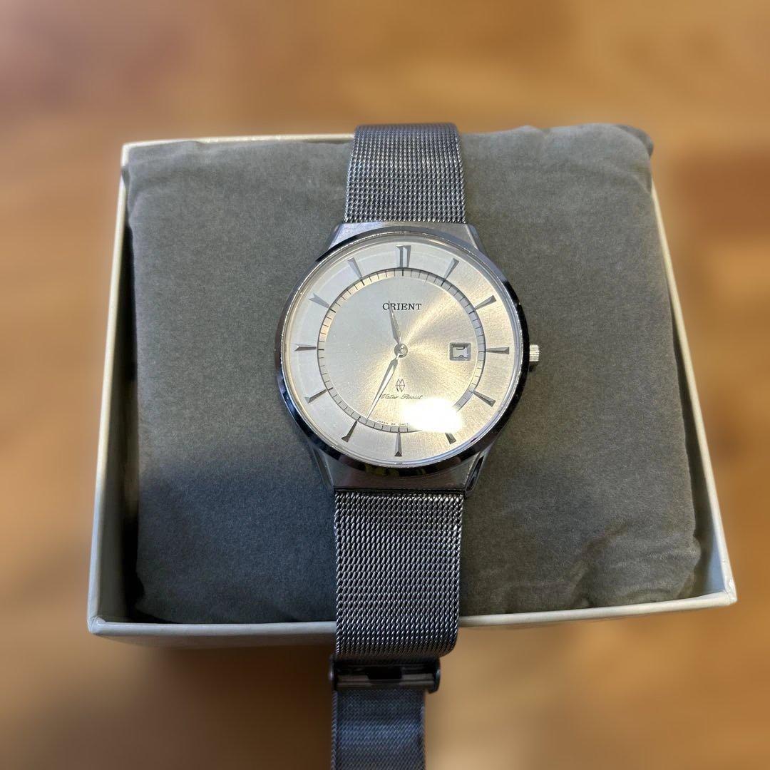 ORIENT silver quartz watch