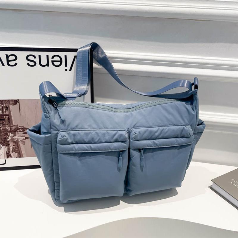 Unisex vodoodpudivá nylonová crossbody taška s více kapsami