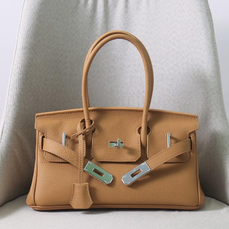

New Togo First-layer Cowhide Horizontal Model, Large-capacity Fashionable Leather Portable Shoulder Commuter Underarm Women s Bag 30x12x16cm