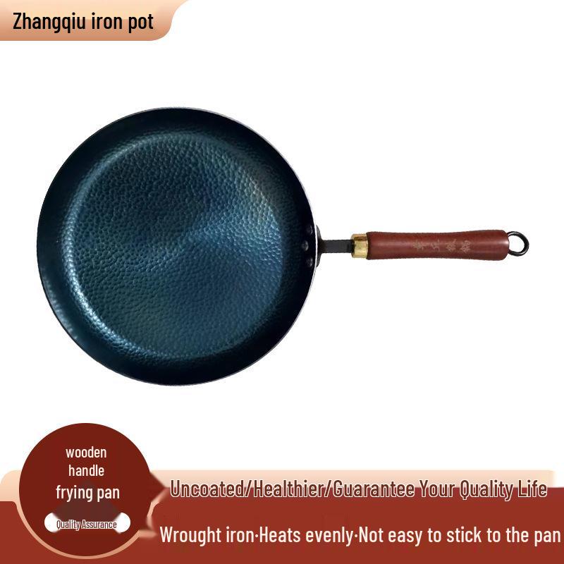 Ručně kovaný litinový nepřilnavý wok s plochým dnem a dřevěnou rukojetí