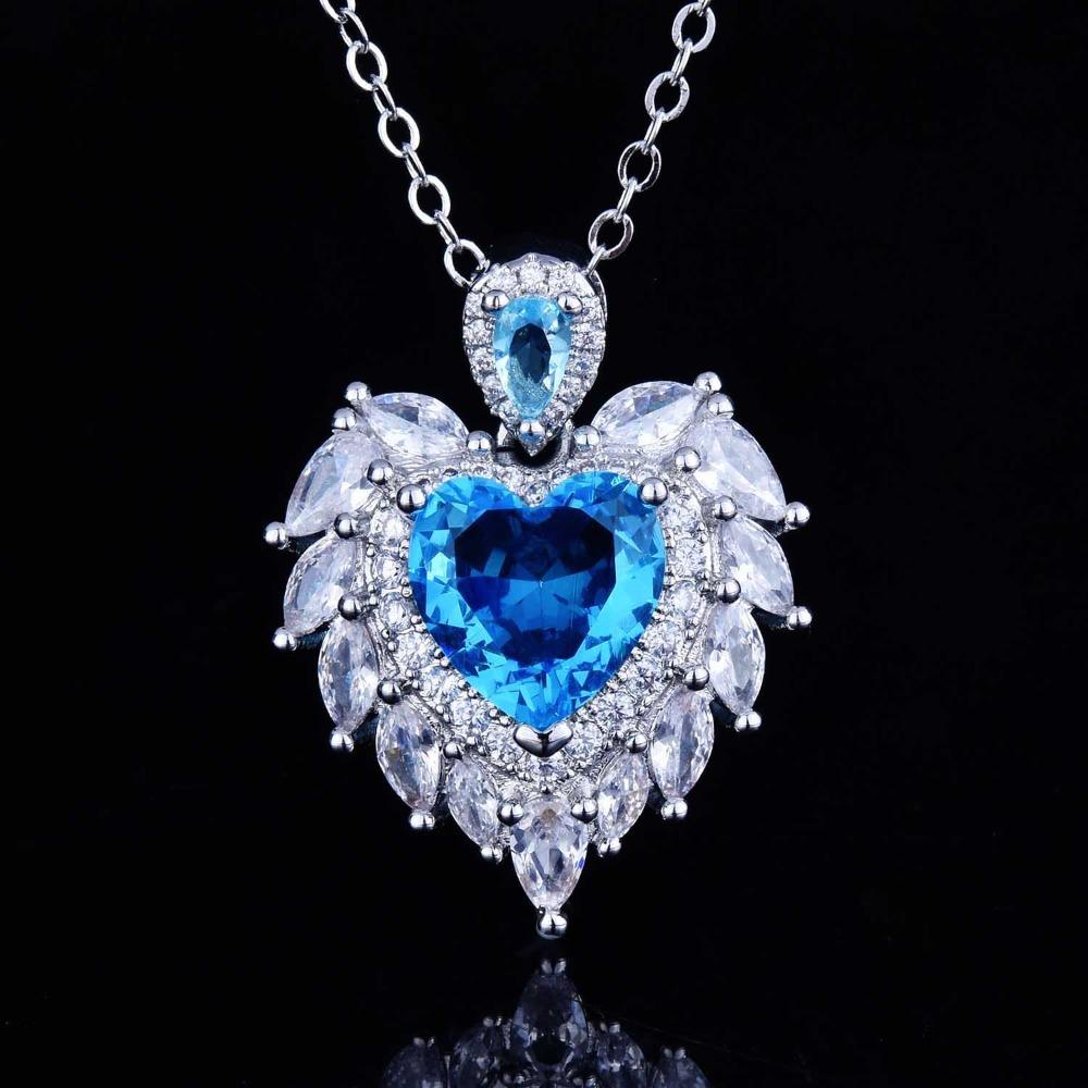 Angel Wing Pendant Necklace with Simulated Aquamarine Heart Wing Jewelry Design for Women
