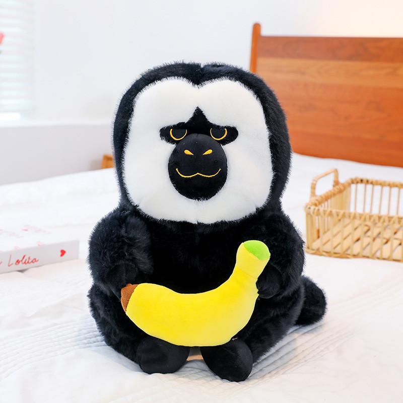 

Charming White-faced Monk Saki Monkey Plush Toy With Soft And Durable Pp Cotton Filling Banana,25cm