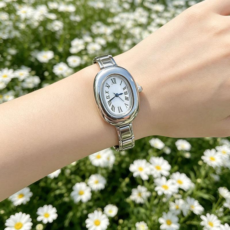 Ins Retro Oval Dial Module Watch Glossy Stainless Steel Band Simple Vertical Roman Scale Elegant Casual Quartz Wrist Watch