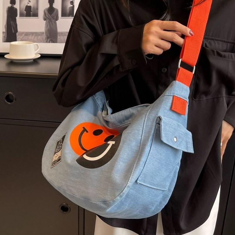 2024 New Korean Style Women's Denim Crossbody Bag: Artistic Smiley Face Canvas with Wide Shoulder Strap