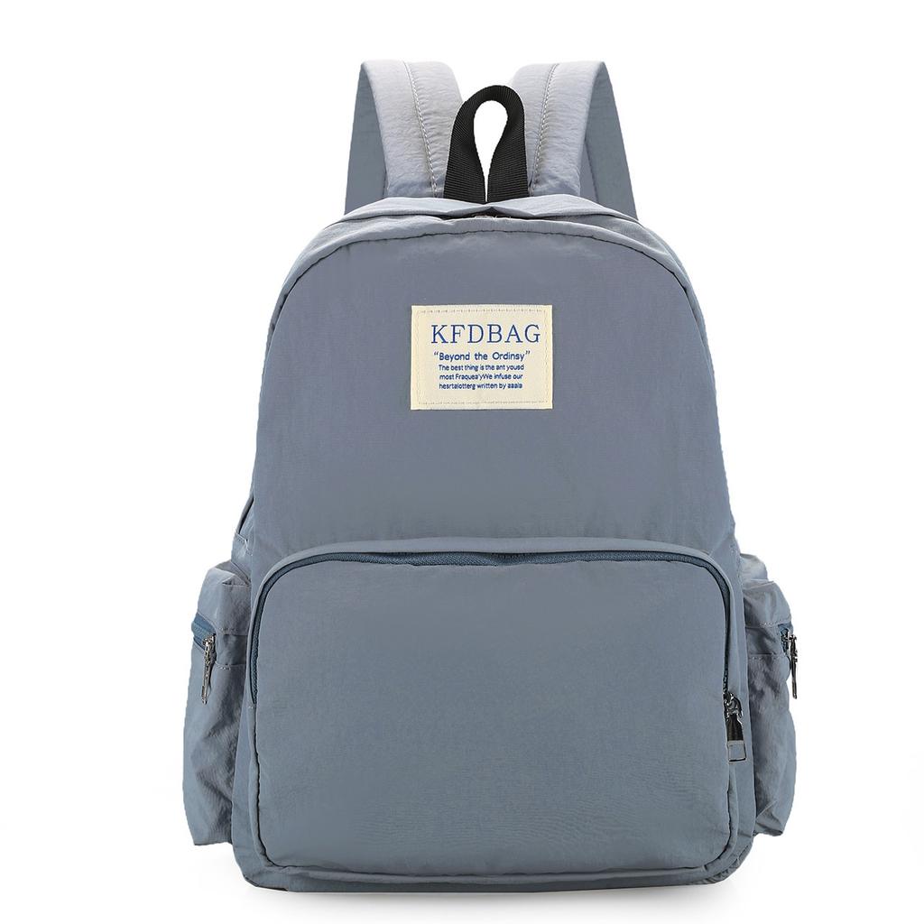 Schoolbag Korean version ins simple solid color backpack Harajuku style big face backpack junior high school college student lightweight versatile
