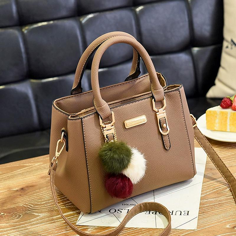 PU-Lederschultertaschen mit Bommel-Dekor für stilvolle Frauen unterwegs