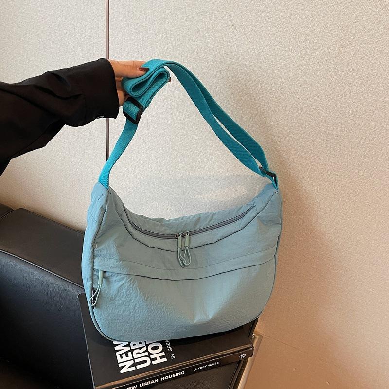 Fashion commuter dumpling bag women's shoulder bag summer new casual versatile small breast bag messenger bag