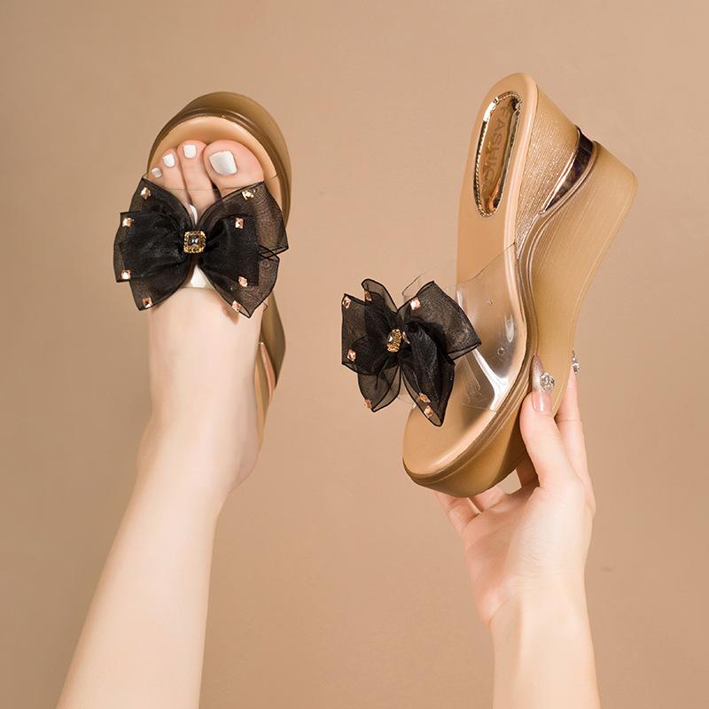 Wedge heel slippers women's summer outer wear 2025 new bow rhinestone high heels waterproof table thick sole fashion sandals