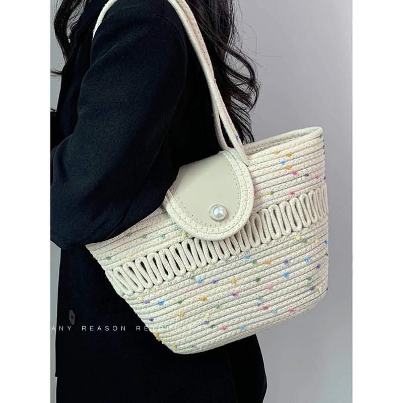

Idyllic hand-woven large-capacity bag women s 2025 new seaside vacation portable shoulder vegetable basket bag