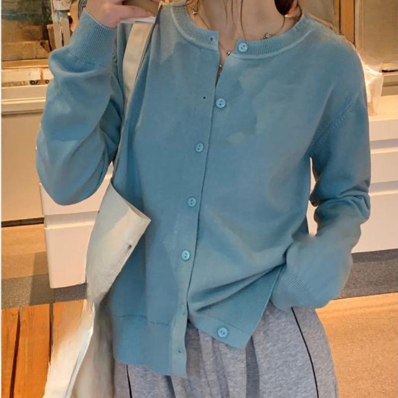 A New Style of Women's Knitted Cardigan Sweater Coat Paired with A Loose Top