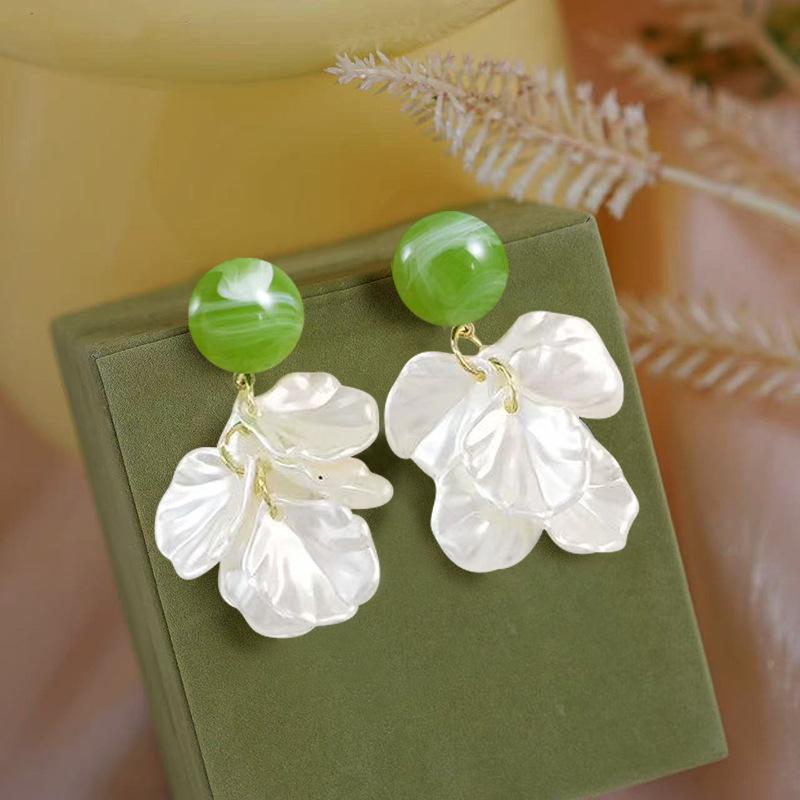 French sweet petal fringed earrings women's niche design petal stud earrings super fairy vacation style high-end earrings