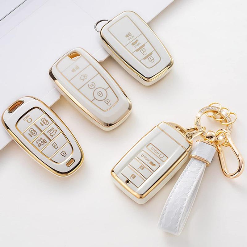 Autoschlüsselabdeckung mit goldenem Rand und Steinmuster, mit Schlüsselanhänger