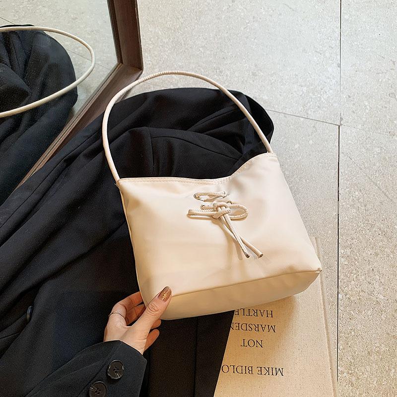 Ballet style women's bag 2025 new trend fashionable sweet handbag niche pearlescent texture shoulder bucket bag