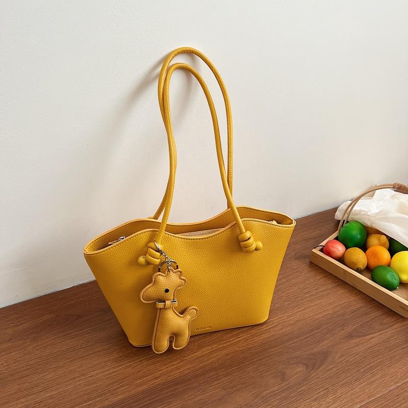 Hand carry versatile bucket bag women's 2025 new fashion texture shoulder bag large capacity casual messenger women's bag