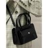 Spring niche casual fashion versatile high-end textured bag women's hand shoulder oblique span small square bag