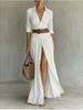 European and American style V-neck thin shirt skirt holiday style long split dress belt design sense