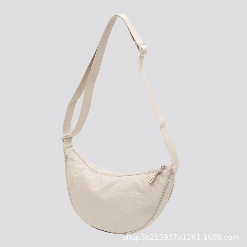 

Youjia fitting room female messenger bag nylon dumpling bag student shoulder bag cloth bag supply