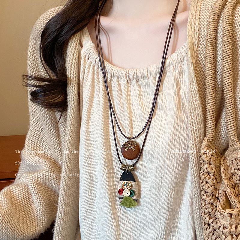 

Retro ethnic style bow button pendant necklace women s long double-layer sweater chain new accessories