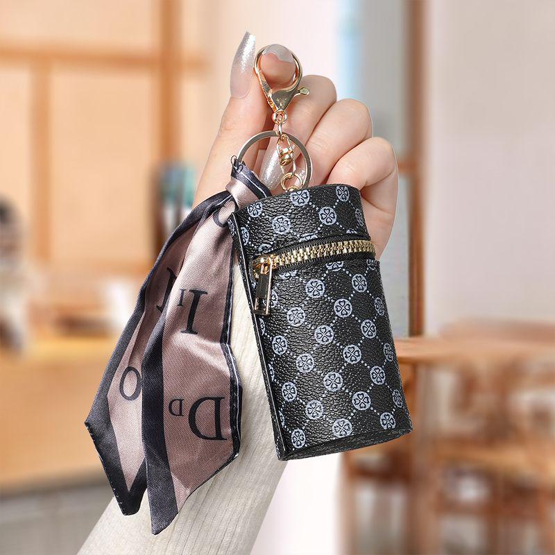 Luxury Coin Purse Pendant: Mini Keychain Bag for Earphones and Lipsticks In Retro Red.