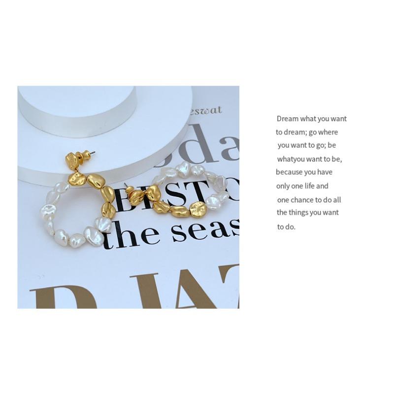 Elegant metal earrings with irregular baroque freshwater pearl inlay