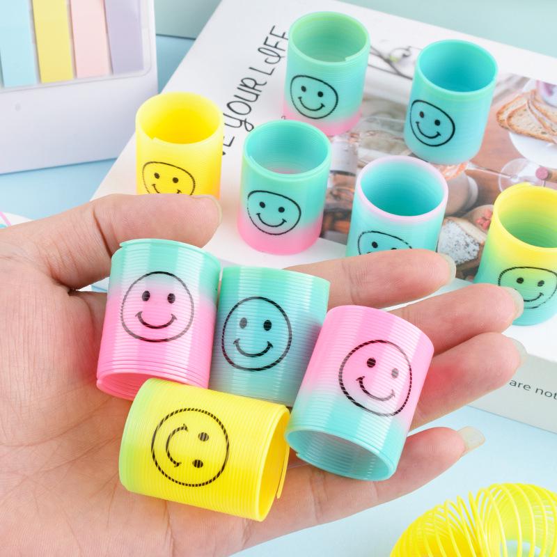 Kids' Colorful Smiling Rainbow Coil Toy - Elastic Spiral with Seven Colors for Street Stall Prizes
