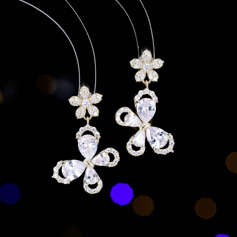 

Новые высококачественные серьги-иглы из серебра 925 пробы для женщин, инкрустированные цирконием, с простыми и универсальными цветами, летящими вместе, серьги-бабочки