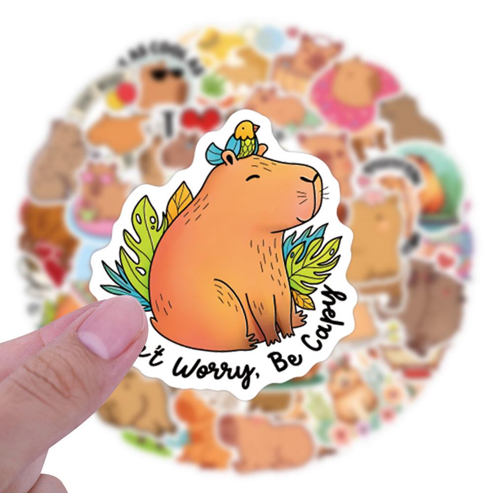 60 Cartoon Anime Capybara Stickers: Waterproof PVC for Cups, Luggage, Helmets, Skateboards, Notebooks.